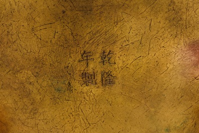 A Chinese gilt bronze tripod censer with buddhist lions, Qianlong mark, 19/20th C.
