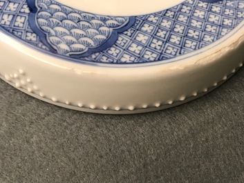 A Chinese blue and white covered bowl with ladies in a garden, Kangxi