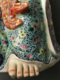 A Chinese famille rose group of two children, impressed marks, Republic, 20th C.