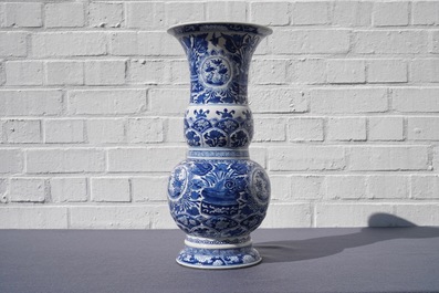 A Chinese blue and white vase with floral design, Kangxi