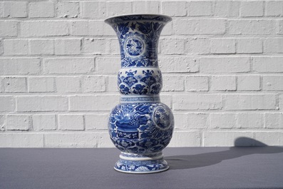 A Chinese blue and white vase with floral design, Kangxi