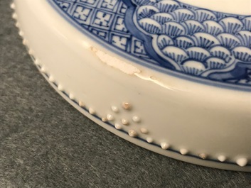 A Chinese blue and white covered bowl with ladies in a garden, Kangxi