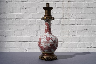 A Chinese underglaze red bottle-shaped 'dragon' vase with gilt-bronze mounts, 18/19th C.