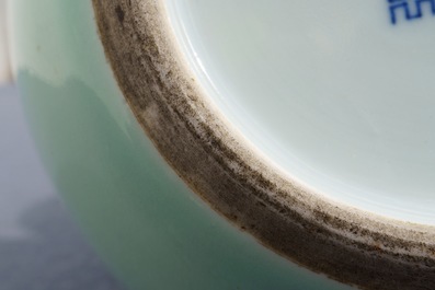 A Chinese monochrome celadon double gourd vase, Qianlong mark, 19th C.