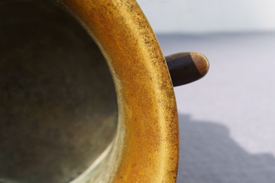 A Chinese bronze tripod censer, Xuande mark, 17/18th C.
