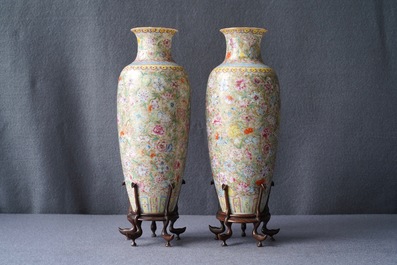 A pair of Chinese famille rose 'millefleurs' eggshell vases, Qianlong mark, Republic, 20th C.