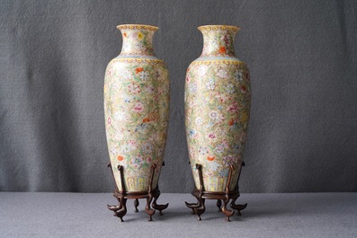 A pair of Chinese famille rose 'millefleurs' eggshell vases, Qianlong mark, Republic, 20th C.