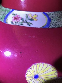 A fine Chinese famille rose ruby ground baluster vase with floral panels, Yongzheng