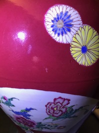A fine Chinese famille rose ruby ground baluster vase with floral panels, Yongzheng
