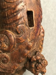 A Chinese carved wood 'Qilin and cub' group, 19/20th C.