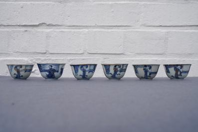 Six Chinese blue and white cups and seven saucers with gilded design, Kangxi/Yongzheng