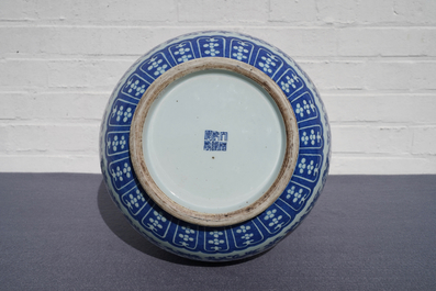 A Chinese blue, white and copper red 'hu' vase, Qianlong mark, 19/20th C.