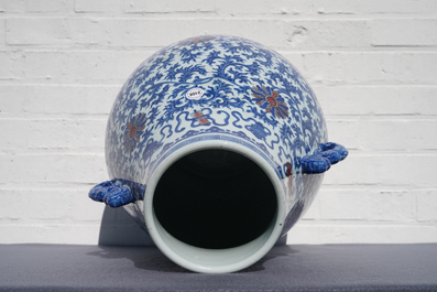 A Chinese blue, white and copper red 'hu' vase, Qianlong mark, 19/20th C.
