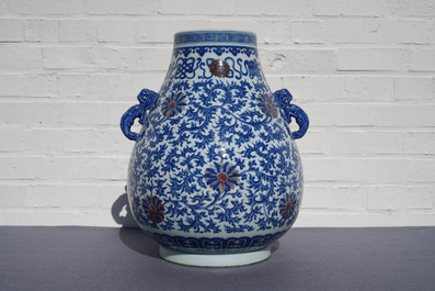 A Chinese blue, white and copper red 'hu' vase, Qianlong mark, 19/20th C.