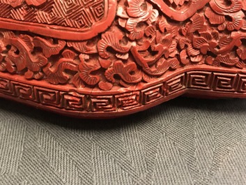 A Chinese cinnabar lacquer box and cover with figures in a landscape, 19th C.