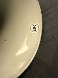 Een Chinese blauw-witte gu vaas met landschapsdecor, Kangxi merk en periode