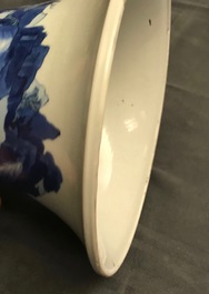 Een Chinese blauw-witte gu vaas met landschapsdecor, Kangxi merk en periode