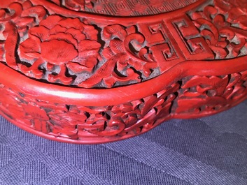 A Chinese carved cinnabar lacquer box and cover, Wanli mark, 18/19th C.