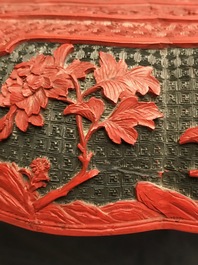 A Chinese cinnabar lacquer box and cover with figures in a landscape, 19th C.