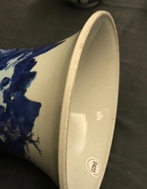 Een Chinese blauw-witte gu vaas met landschapsdecor, Kangxi merk en periode