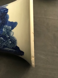 Een Chinese blauw-witte gu vaas met landschapsdecor, Kangxi merk en periode