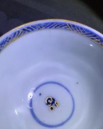 Six Chinese blue and white cups and seven saucers with gilded design, Kangxi/Yongzheng
