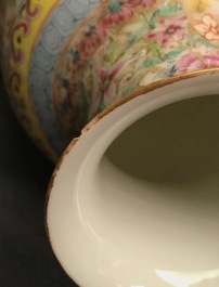 A pair of Chinese famille rose 'millefleurs' eggshell vases, Qianlong mark, Republic, 20th C.