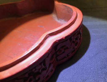 A Chinese carved cinnabar lacquer box and cover, Wanli mark, 18/19th C.