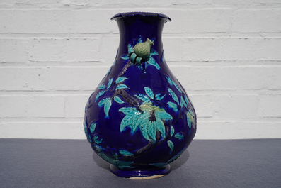 A Chinese fahua relief-decorated vase, 19th C.