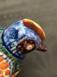 A polychrome Dutch Delft group of a hen with chickens, 18th C.