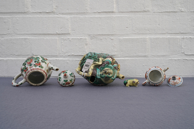 Four Chinese famille rose, verte and Imari-style teapots and a tea caddy, Kangxi and later
