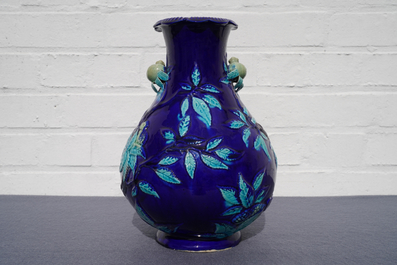 A Chinese fahua relief-decorated vase, 19th C.