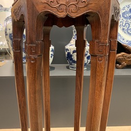 A Chinese wooden stand with marble top, 19/20th C.