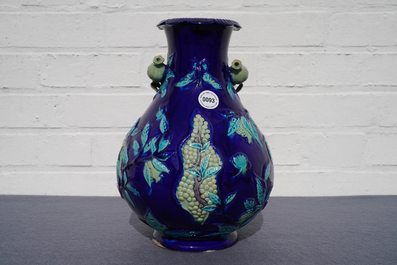 A Chinese fahua relief-decorated vase, 19th C.