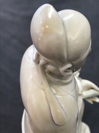 Een Chinese Dehua blanc de Chine groep met Wenchang Wang en Guixing, Kangxi