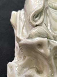 Een Chinese Dehua blanc de Chine groep met Wenchang Wang en Guixing, Kangxi