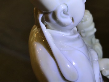 Een Chinese Dehua blanc de Chine groep met Wenchang Wang en Guixing, Kangxi