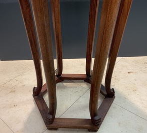 A Chinese wooden stand with marble top, 19/20th C.