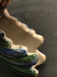 A polychrome Dutch Delft group of a hen with chickens, 18th C.