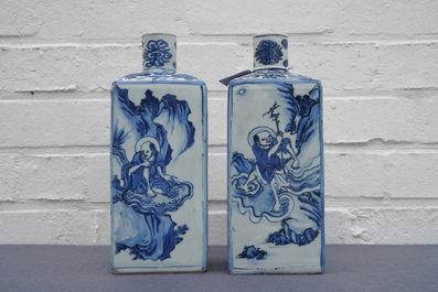 A pair of square Chinese blue and white 'immortals' tea caddies, Wanli