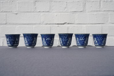 Twelve Chinese blue and white cups and saucers, 19th C.