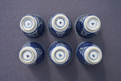 Twelve Chinese blue and white cups and saucers, 19th C.