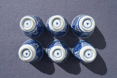 Twelve Chinese blue and white cups and saucers, 19th C.