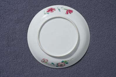 A fine Chinese famille rose cup and saucer with floral design, Yongzheng