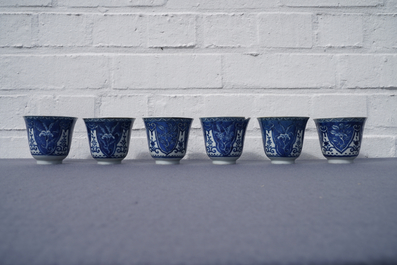 Twelve Chinese blue and white cups and saucers, 19th C.