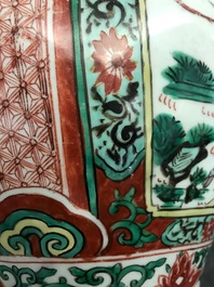 A Chinese wucai &lsquo;mythical beasts&rsquo; vase and cover, Transitional period