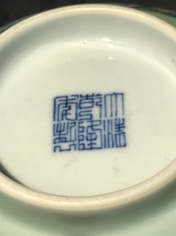 A Chinese famille rose celadon-ground bowl with floral design, Qianlong mark, 19/20th C.