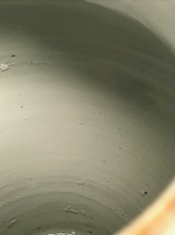 A Chinese wucai &lsquo;mythical beasts&rsquo; vase and cover, Transitional period