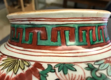 A Chinese wucai &lsquo;mythical beasts&rsquo; vase and cover, Transitional period