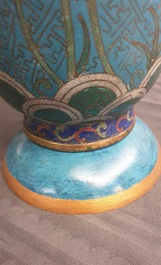 A Chinese cloisonn&eacute; rouleau vase and four jardini&egrave;res, 19/20th C.